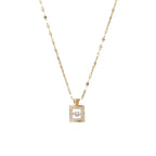Collier pendentif flacon de parfum sur chaîne dorée