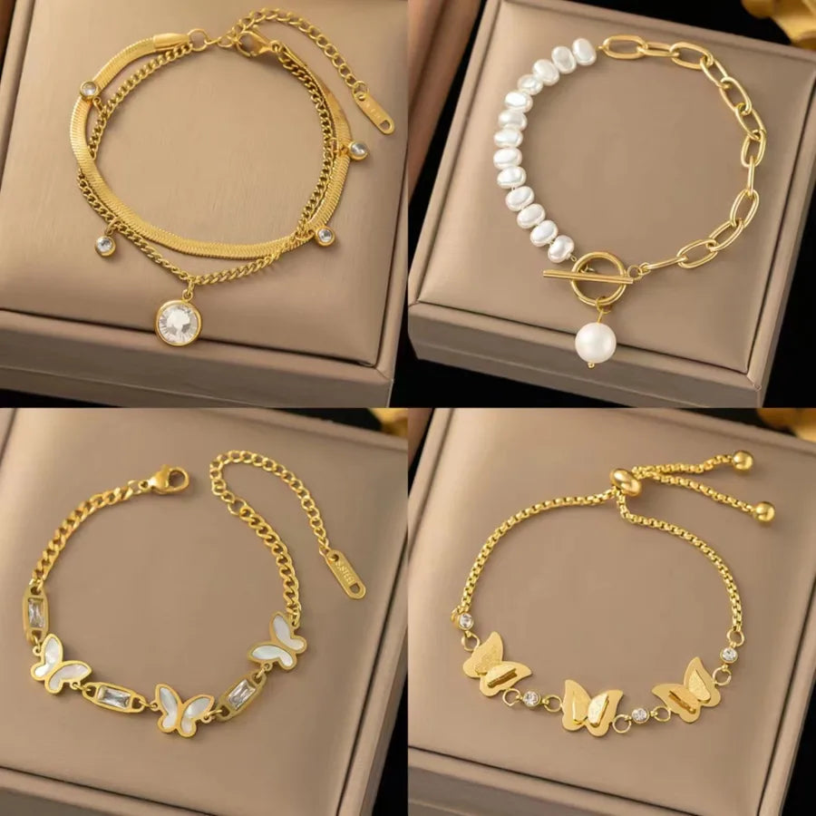 Bracelet papillon doré et perle d'eau douce